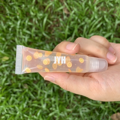 Etiqueta privada Gloss de oliva para labios Tubos de compresión de aceite de oliva para labios con aroma a fruta