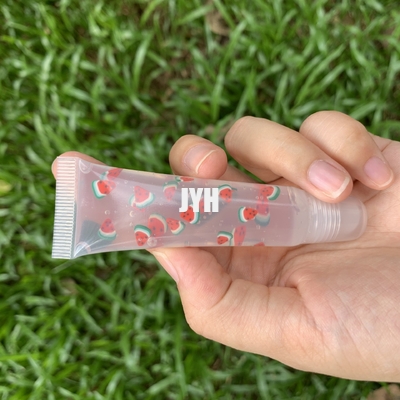 Etiqueta privada Gloss de oliva para labios Tubos de compresión de aceite de oliva para labios con aroma a fruta