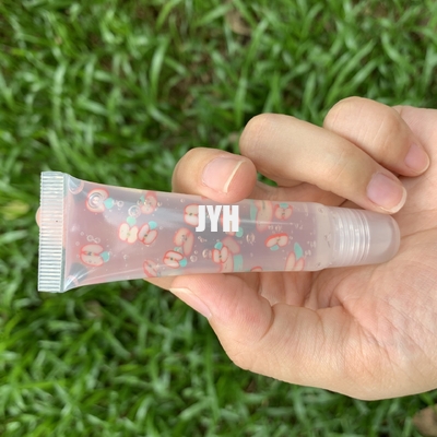 Etiqueta privada Gloss de oliva para labios Tubos de compresión de aceite de oliva para labios con aroma a fruta